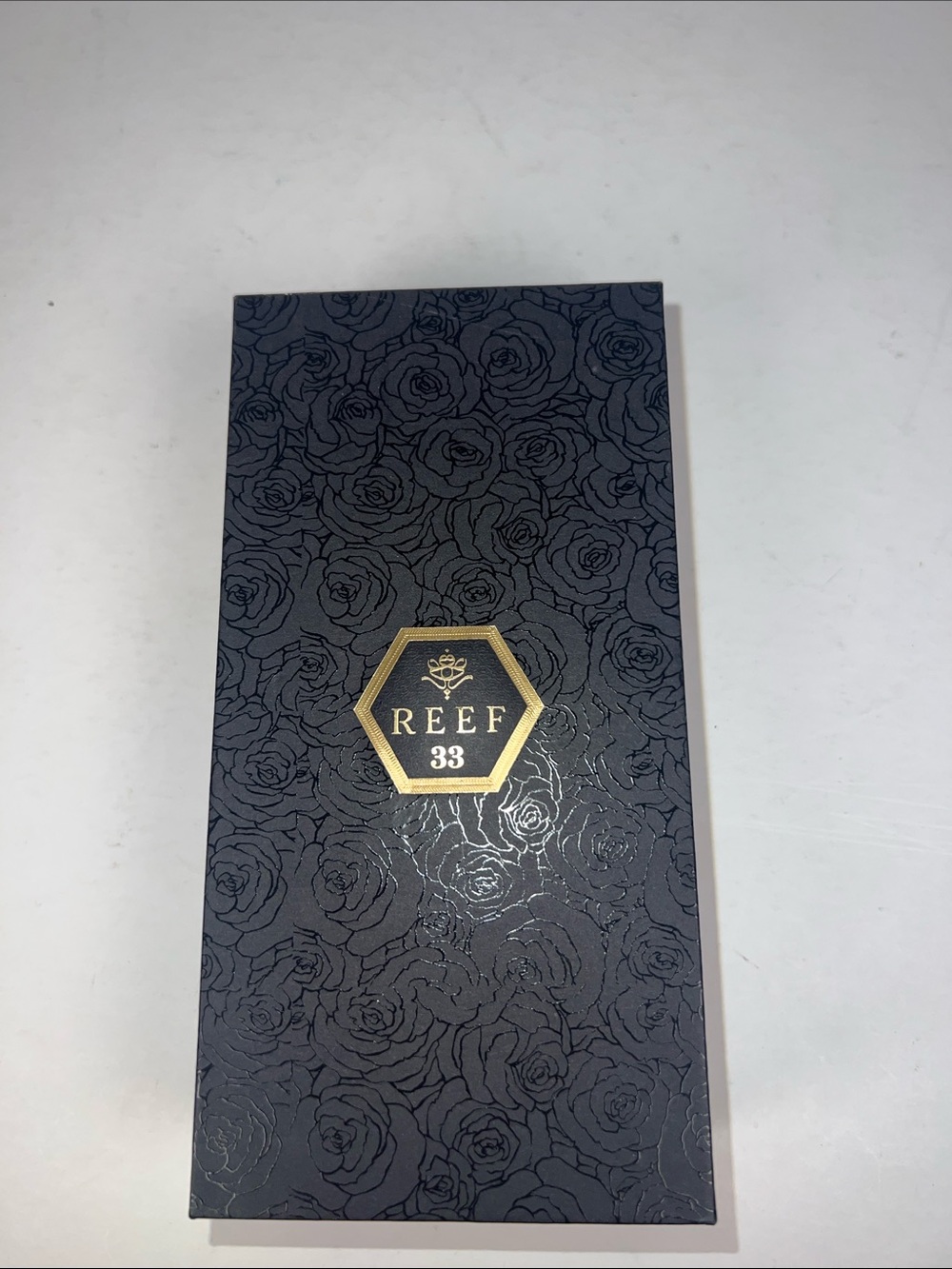 Reef Navy Box with Gold Hexagon Logo